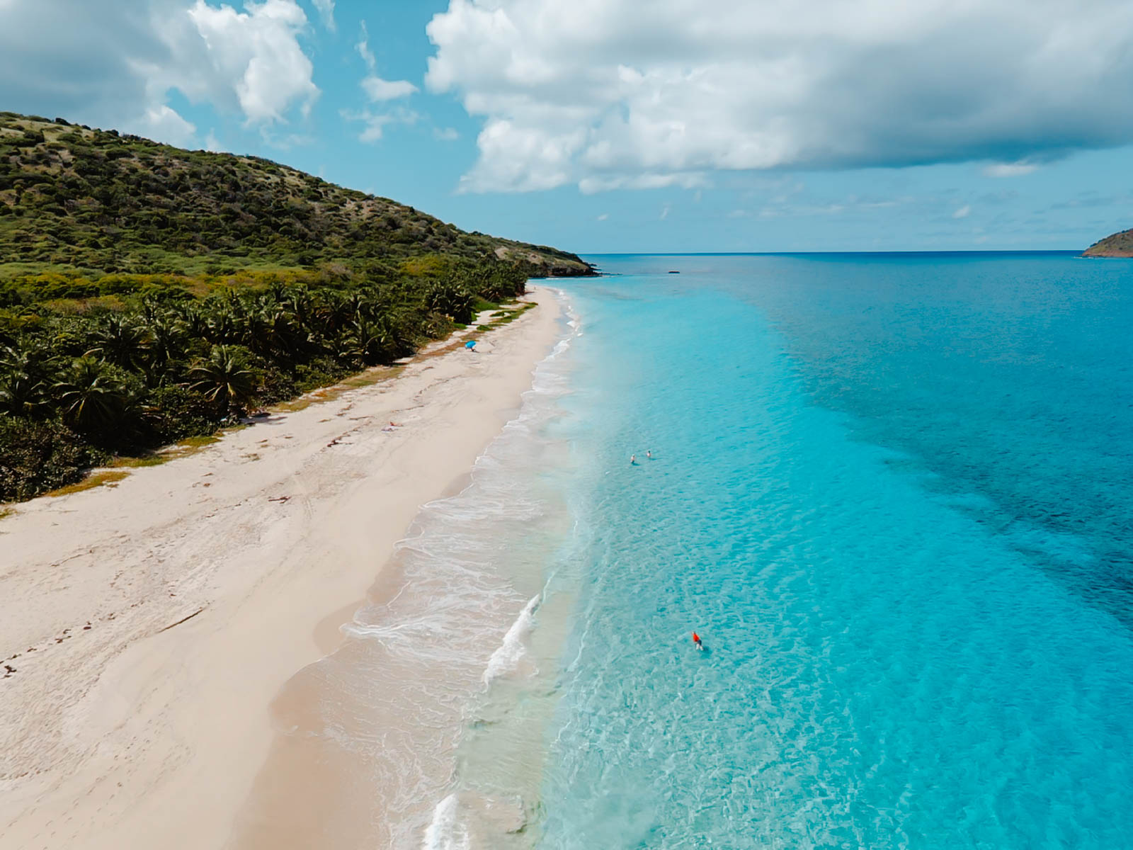 Drone view of Zoni Beach’s white sand and turquoise waters in Culebra, Puerto Rico

