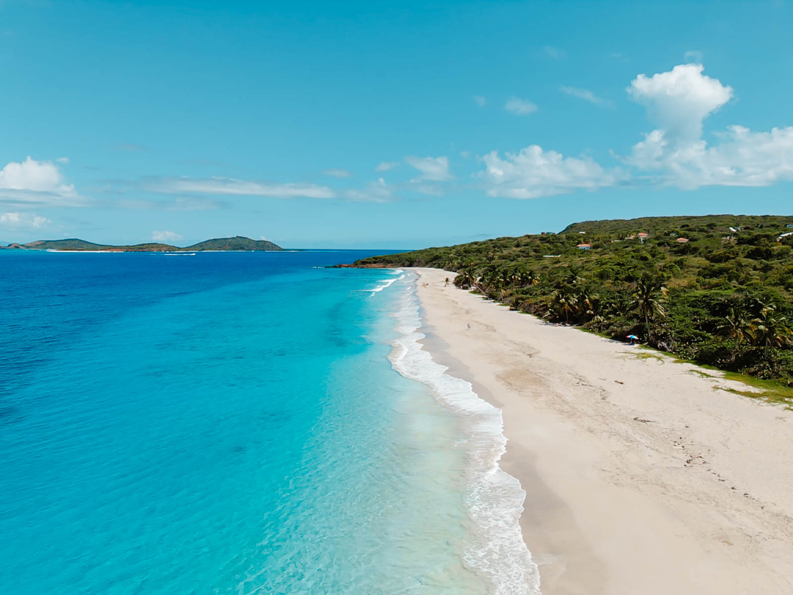 Drone view of Zoni Beach’s white sand and turquoise waters in Culebra, Puerto Rico

